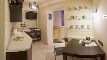 Apartment, 1 Bedroom | Private kitchen | Fridge, microwave, oven, stovetop