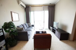 Apartment, 2 Bedrooms | Living room | LCD TV - Apatel Senayan Residence (Jakarta)