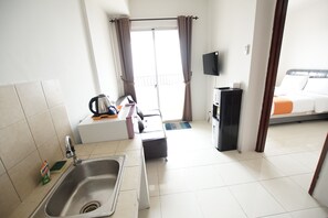 Appartement, 1 chambre | Aire de séjour | Téléviseur ACL