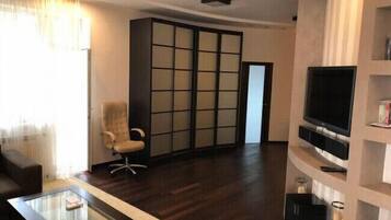 Apartment, 1 Bedroom | Living area | Flat-screen TV