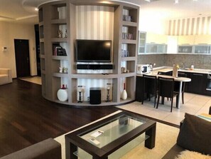 Apartment, 1 Bedroom | Living area | Flat-screen TV - Apart Kiev Chernovola 2 (Kyiv)