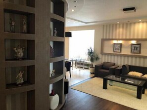 Apartment, 1 Schlafzimmer | Wohnbereich | Flachbildfernseher