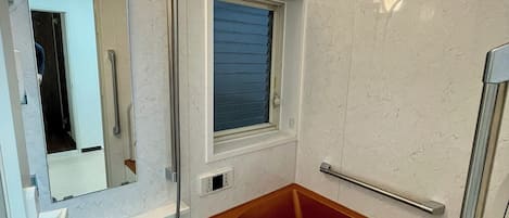 Basic Apartment, 1 Bedroom | Bathroom | Combined shower/tub, hair dryer, slippers, towels