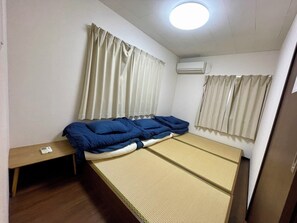 Elite-Apartment, Balkon | 1 Schlafzimmer, individuell eingerichtet, Verdunkelungsvorhänge