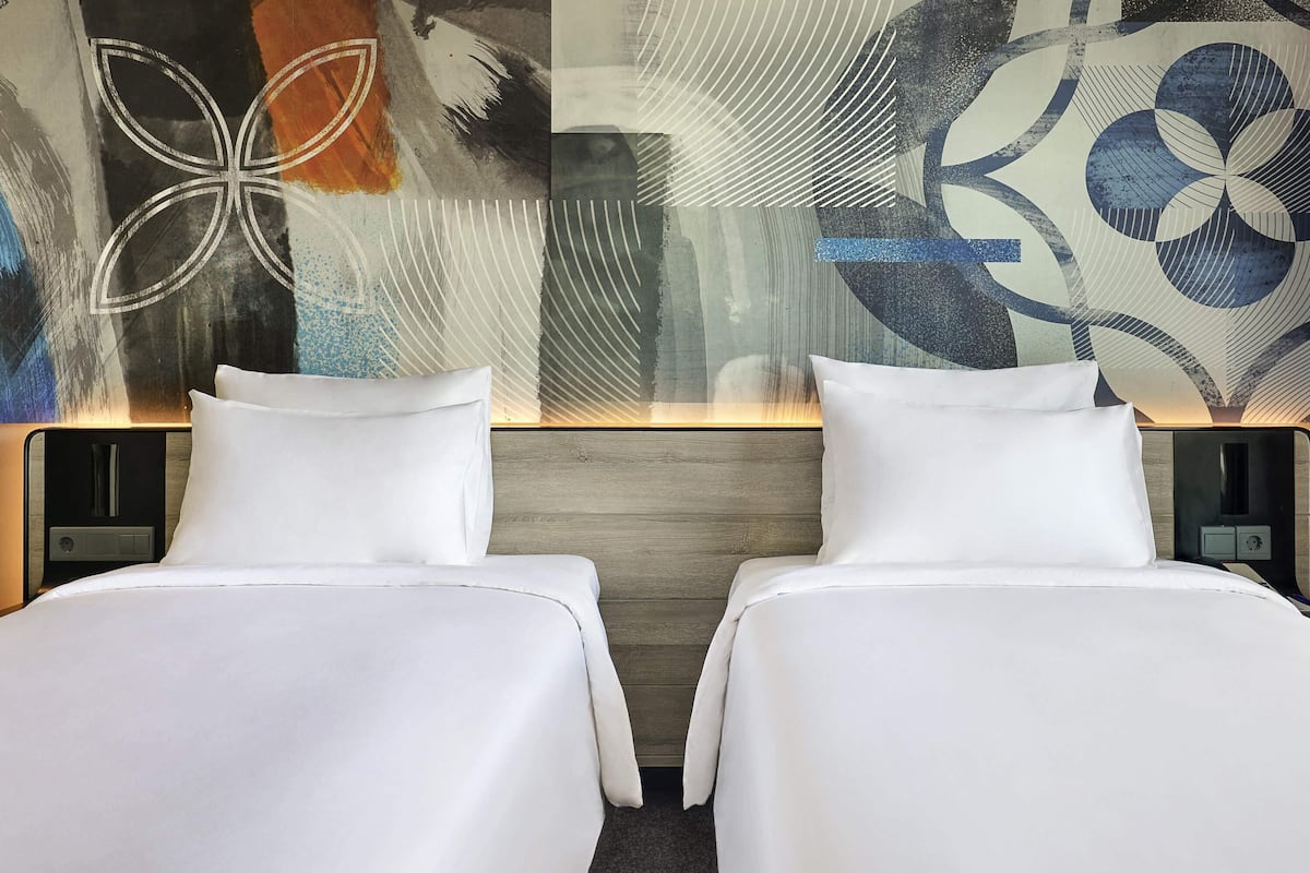 superior studio, 2 single beds | desk, laptop workspace, blackout curtains, soundproofing