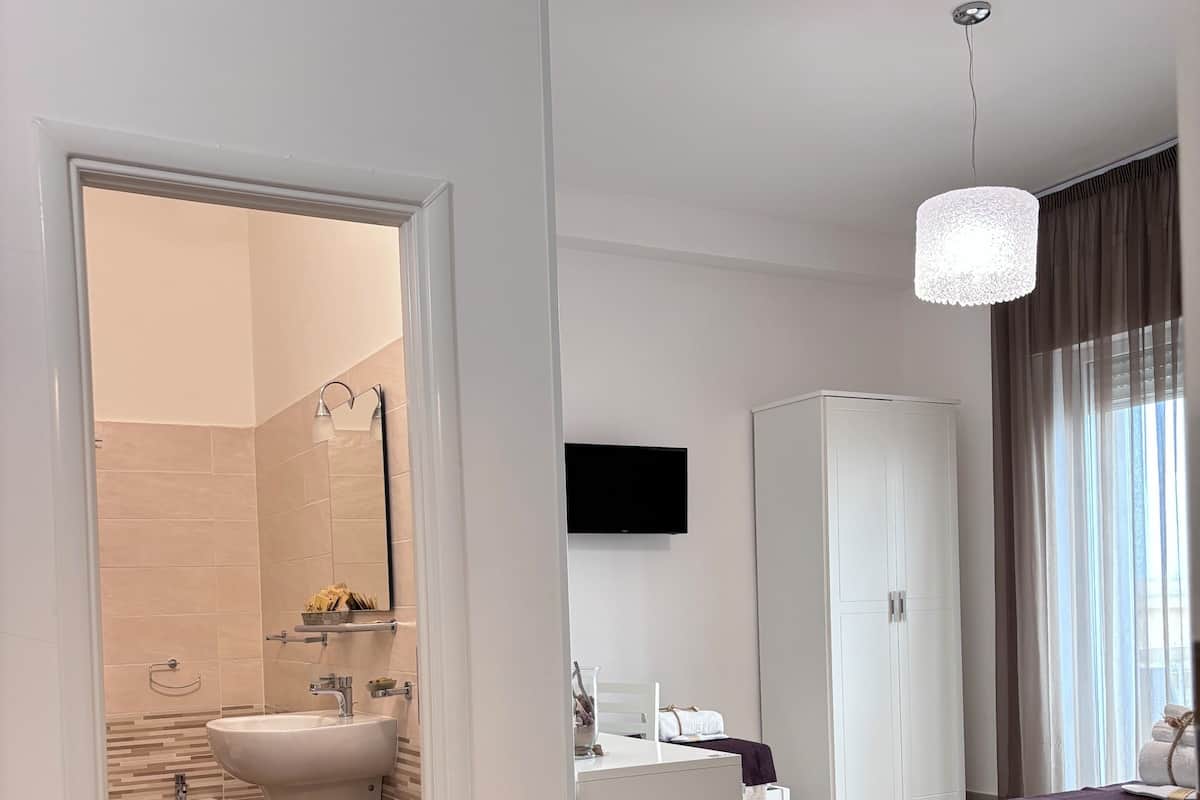 Habitación Premium | Ropa de cama de alta calidad y camas con efecto memoria