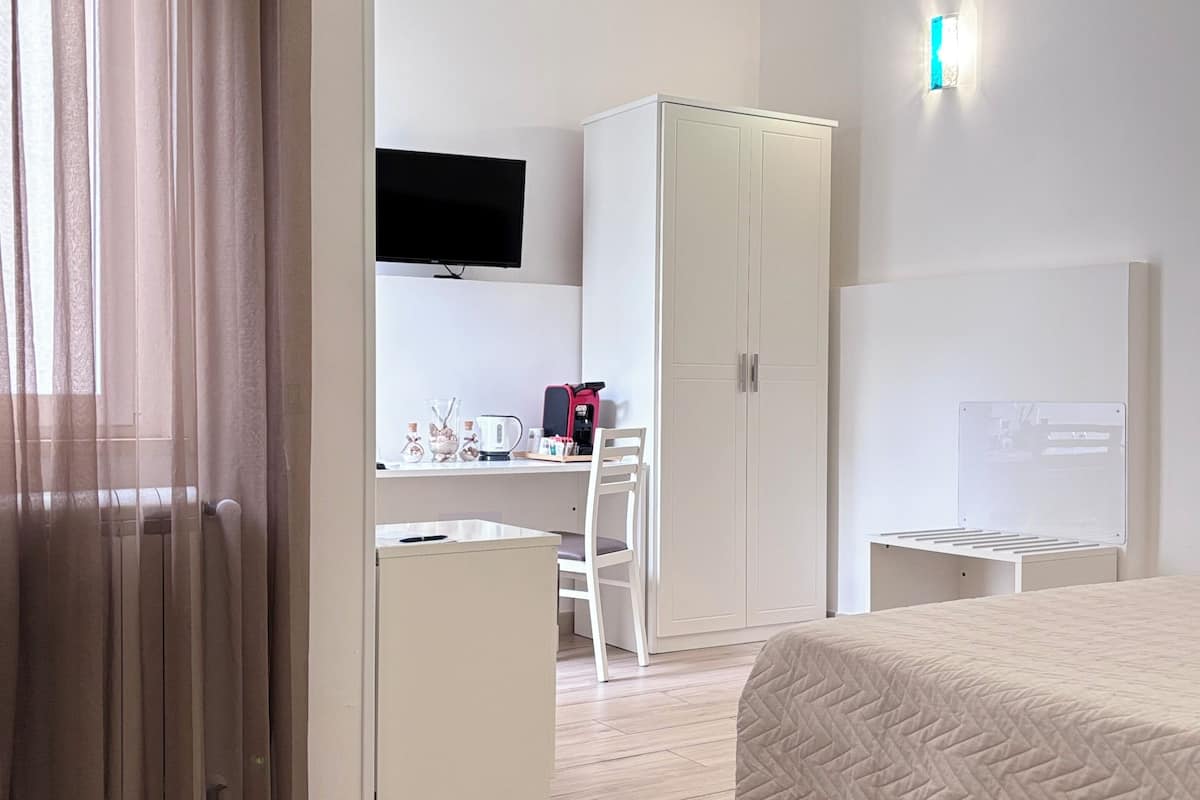 Habitación exclusiva | Ropa de cama de alta calidad y camas con efecto memoria