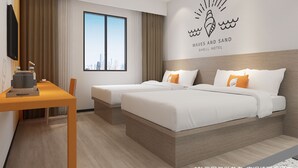 A hotel room with two beds, a desk, and a large window with a city view. - GreenTree Inn Nanchang Honggutan New Area Cuiyuan Road Subway Station Business Hotel (Nanchang)