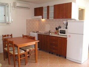 Apartment, 2 Bedrooms, Terrace | Private kitchen | Full-size fridge, microwave, oven, stovetop - Villa Vanda Seafront Apartments (Konavle)