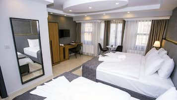 Ropa de cama de alta calidad y minibar