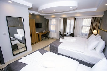 Ropa de cama de alta calidad y minibar