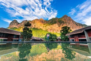 Outdoor pool, open 7:00 AM to 8:00 PM, pool umbrellas, sun loungers