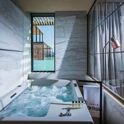 Grand Suite, 2 Bedrooms, Hot Tub, Partial Sea View (Emotion) | Bathroom | Shower, rainfall showerhead, designer toiletries, hair dryer