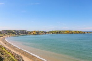 Overlooking the serene coastline, this property offers stunning ocean views.