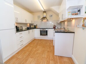 Cottage | Private kitchen | Microwave, stovetop, dishwasher, highchair