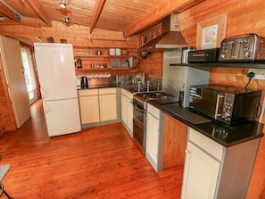 Cottage | Private kitchen | Microwave, stovetop, dishwasher, highchair - The Lodge (Milford Haven)