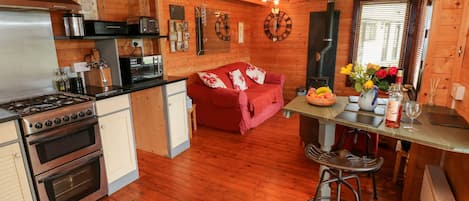 Cottage | Private kitchen | Microwave, stovetop, dishwasher, highchair