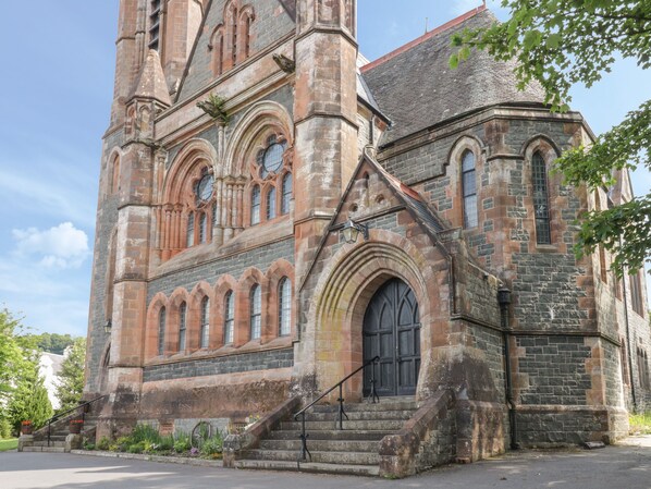 A historic church with arched windows and a prominent tower. - Duplex (Moffat)