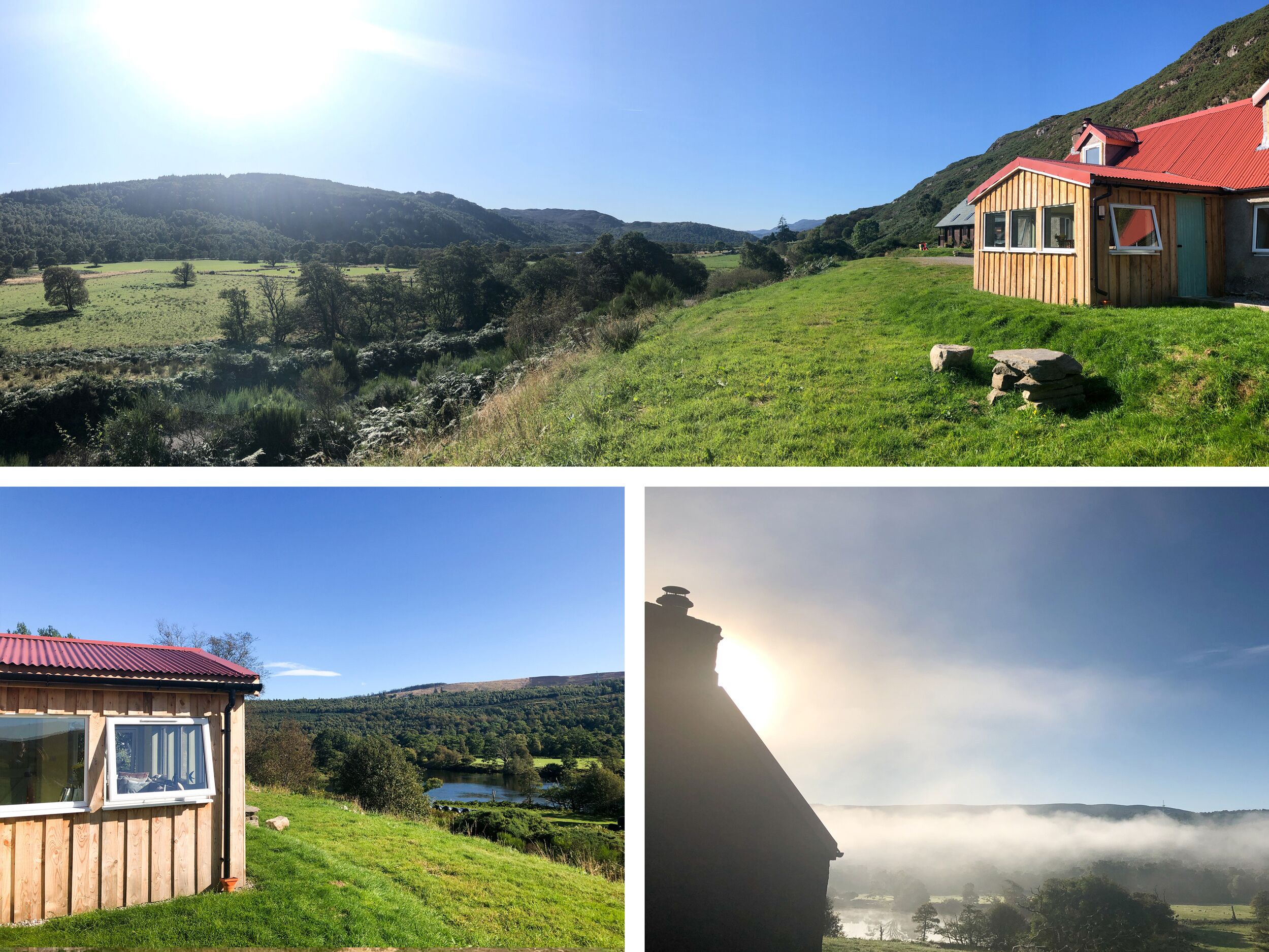 Une cabane en bois avec un toit rouge, entourée de champs et de collines verdoyants.