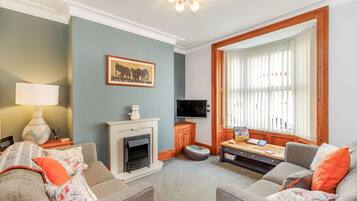 Cottage | Woonkamer | Een dvd-speler