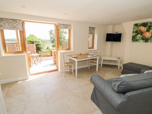 Cottage | Living room | TV - Cider Cottage (Stratford-upon-Avon)