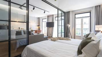 Laptop workspace, blackout curtains, soundproofing, iron/ironing board