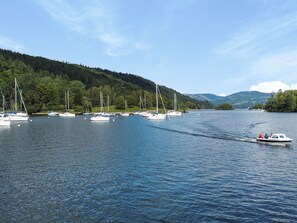 Enjoy serene lakeside views and tranquil surroundings, perfect for a leisurely boat ride.