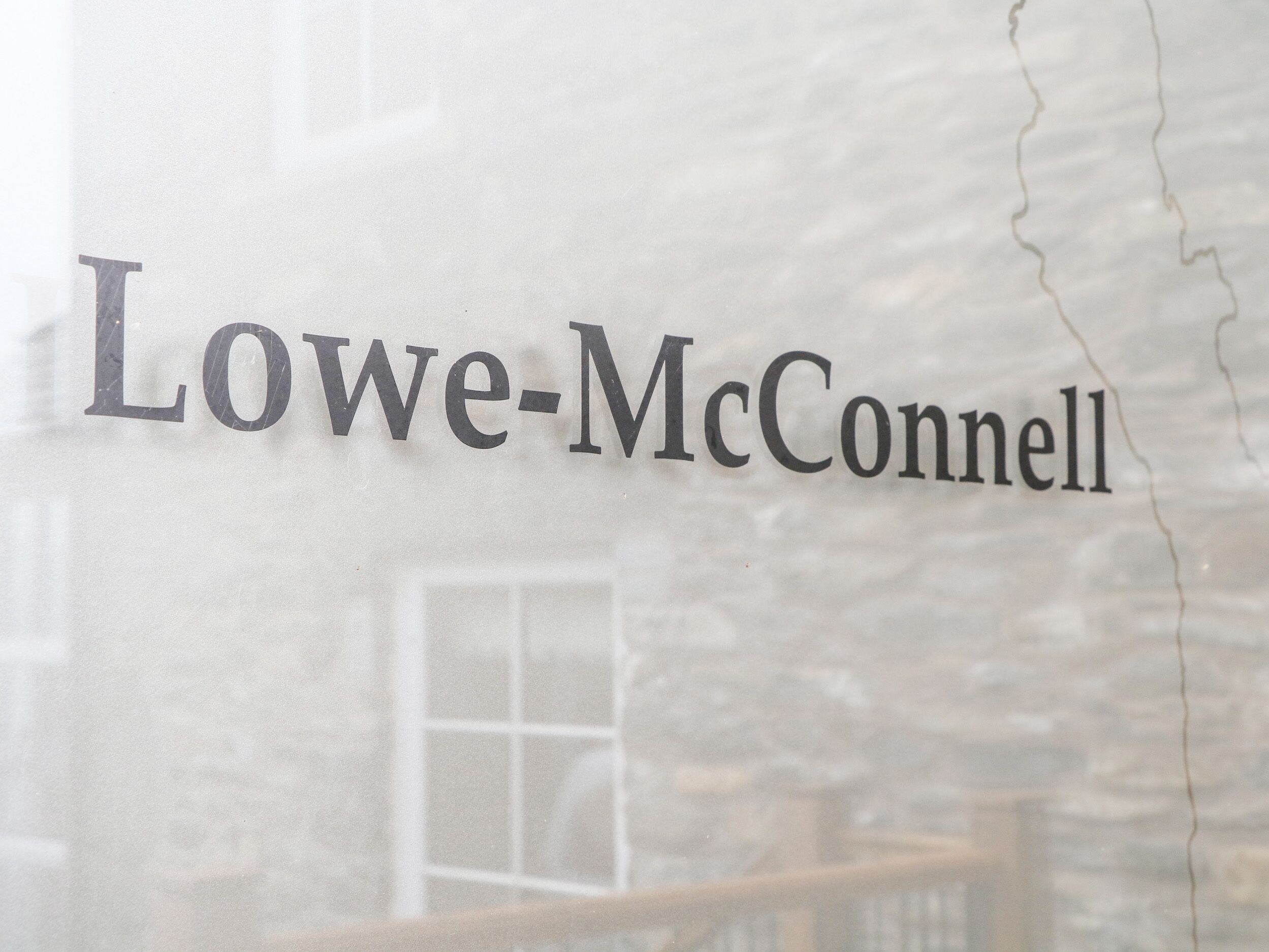 A sign with the name "Lowe-McConnell".