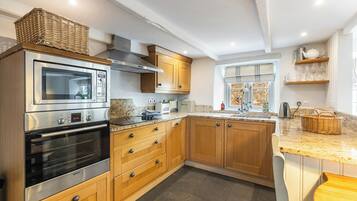 คอทเทจ | ครัวส่วนตัว | ตู้เย็น, ไมโครเวฟ, เตาประกอบอาหาร, เครื่องล้างจาน