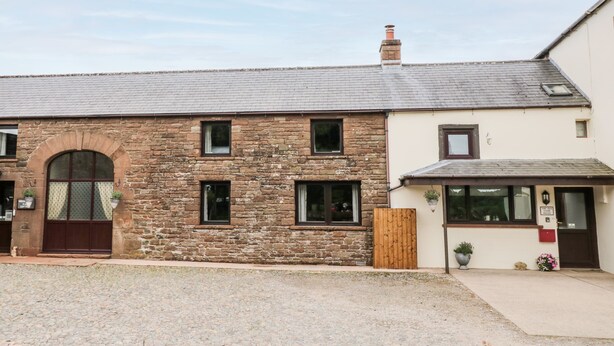A two-story stone building with a small attached structure. - The Old Cook House (Penrith)