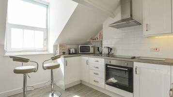 Cottage | Dapur pribadi | Microwave, mesin pencuci piring, ketel listrik, dan pemanggang roti