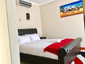 Standard Double Room | Desk, iron/ironing board, bed sheets