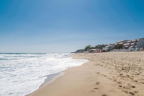 Praia particular, areia branca