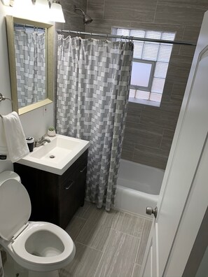 Business House | Bathroom - The Elmhurst Experience (Elmhurst)