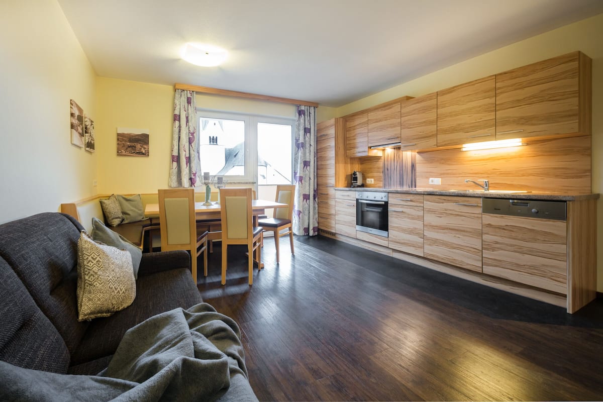 Superior Apartment, 2 Bedrooms (excl. 185 EUR cleaning fee) | Living area | Flat-screen TV, toys