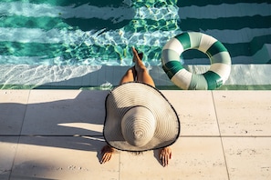 Outdoor pool, pool umbrellas, pool loungers