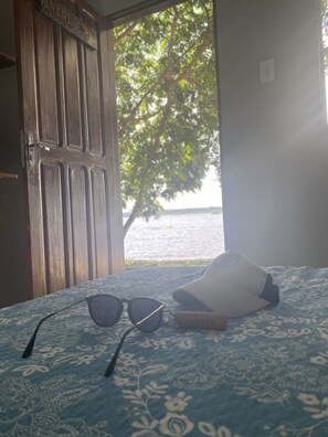 Habitación superior | Cortinas blackout y ropa de cama 