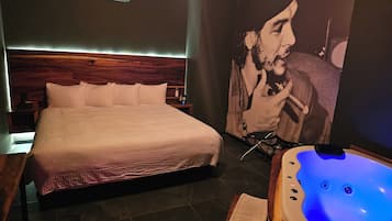 Suite, Hot Tub | Down comforters, in-room safe, individually decorated