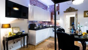 Lägenhet Deluxe | Vardagsrum | Platt-tv och dvd-spelare