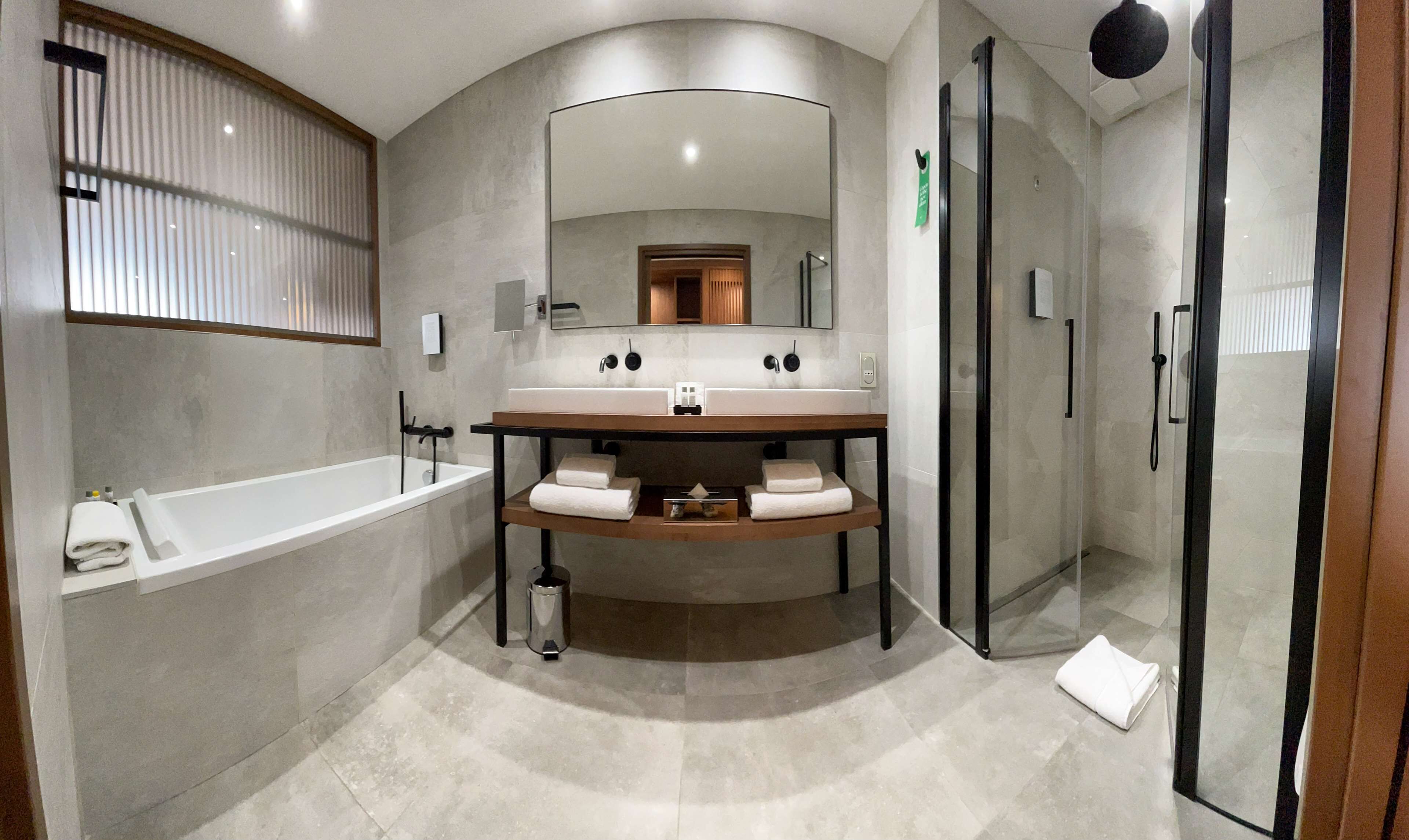 junior suite, 1 king bed, balcony, sea view | bathroom | eco-friendly toiletries, hair dryer, slippers, towels