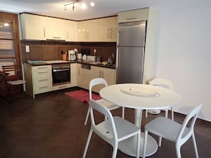 Dishwasher, coffee/tea maker, cookware/dishes/utensils