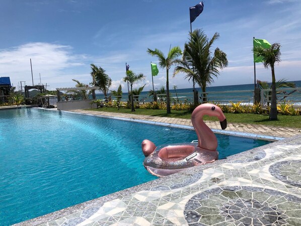 Outdoor pool, open 7:00 AM to 7:00 PM, sun loungers