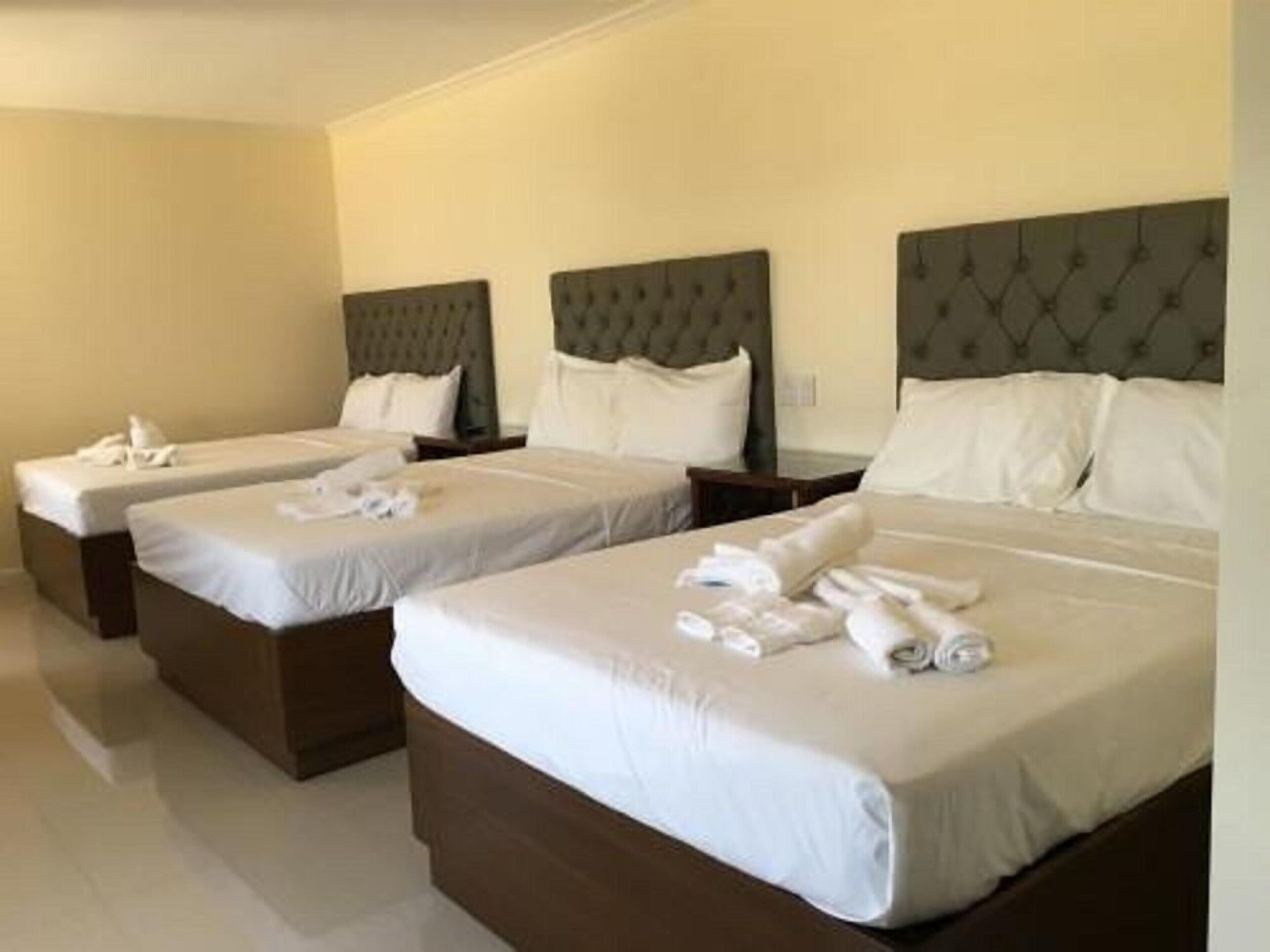 Blackout curtains, soundproofing, iron/ironing board, rollaway beds