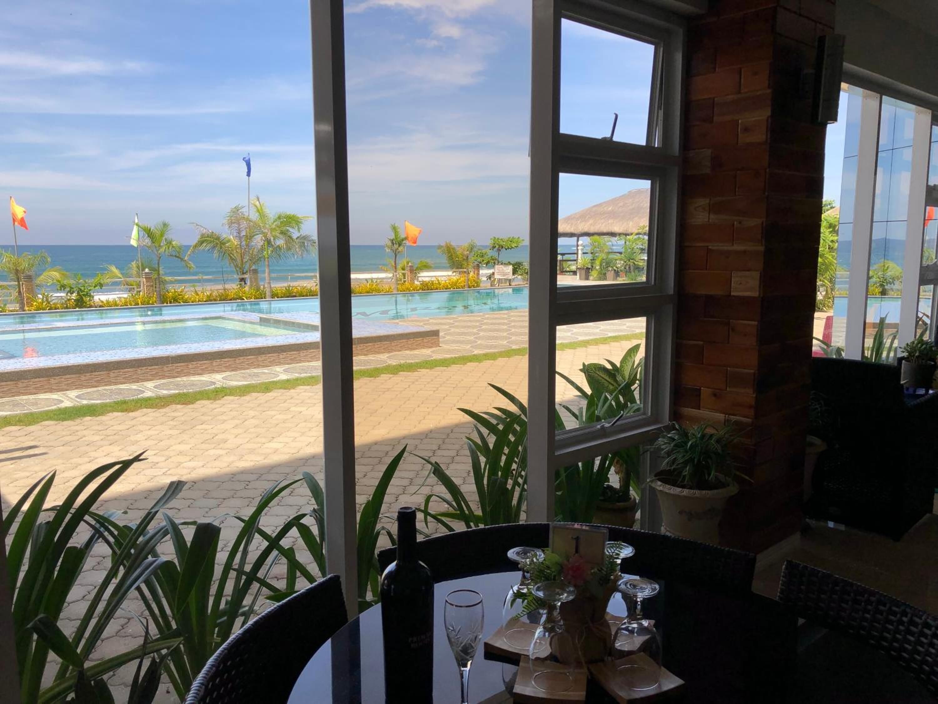 Breakfast, lunch, dinner served; beach views