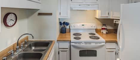 Microwave, coffee/tea maker, toaster, cookware/dishes/utensils