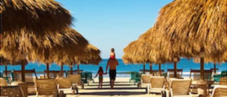 A la platja, gandules de platja i tovalloles de platja