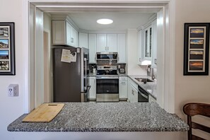 Microwave, coffee/tea maker, toaster, cookware/dishes/utensils