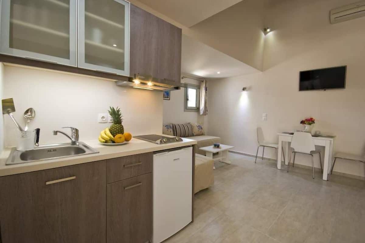 family apartment (split level - 4 adults) | private kitchen | mini-fridge, stovetop, electric kettle, cookware/dishes/utensils
