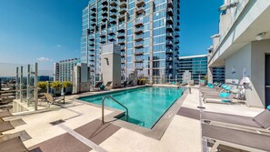 Outdoor pool, open 8:00 AM to 9:00 PM, pool umbrellas, pool loungers