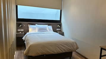 Deluxe Room | Pillow-top beds, blackout curtains, free WiFi, bed sheets